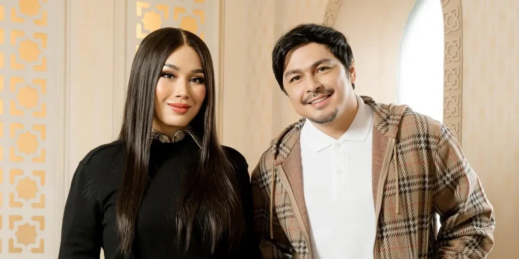 Diva Titi DJ mengungkapkan perasaannya yang mendalam terhadap penyanyi Thomas Djorghi. Foto ini menampilkan Titi DJ dan Thomas Djorghi bersama, memicu spekulasi tentang hubungan romantis mereka.